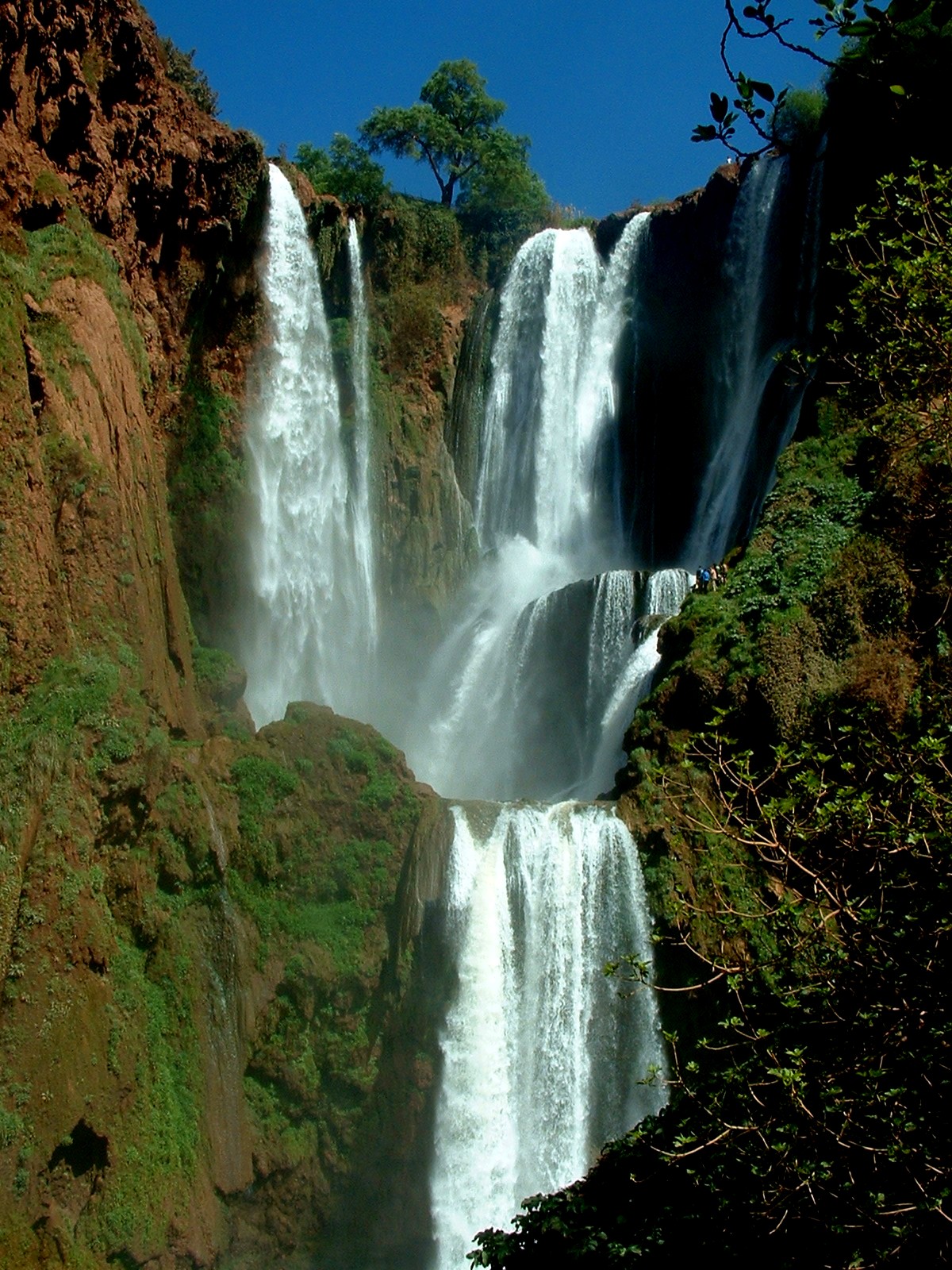 The Ouzoud Waterfalls cascading between rocky cliffs in Morocco.